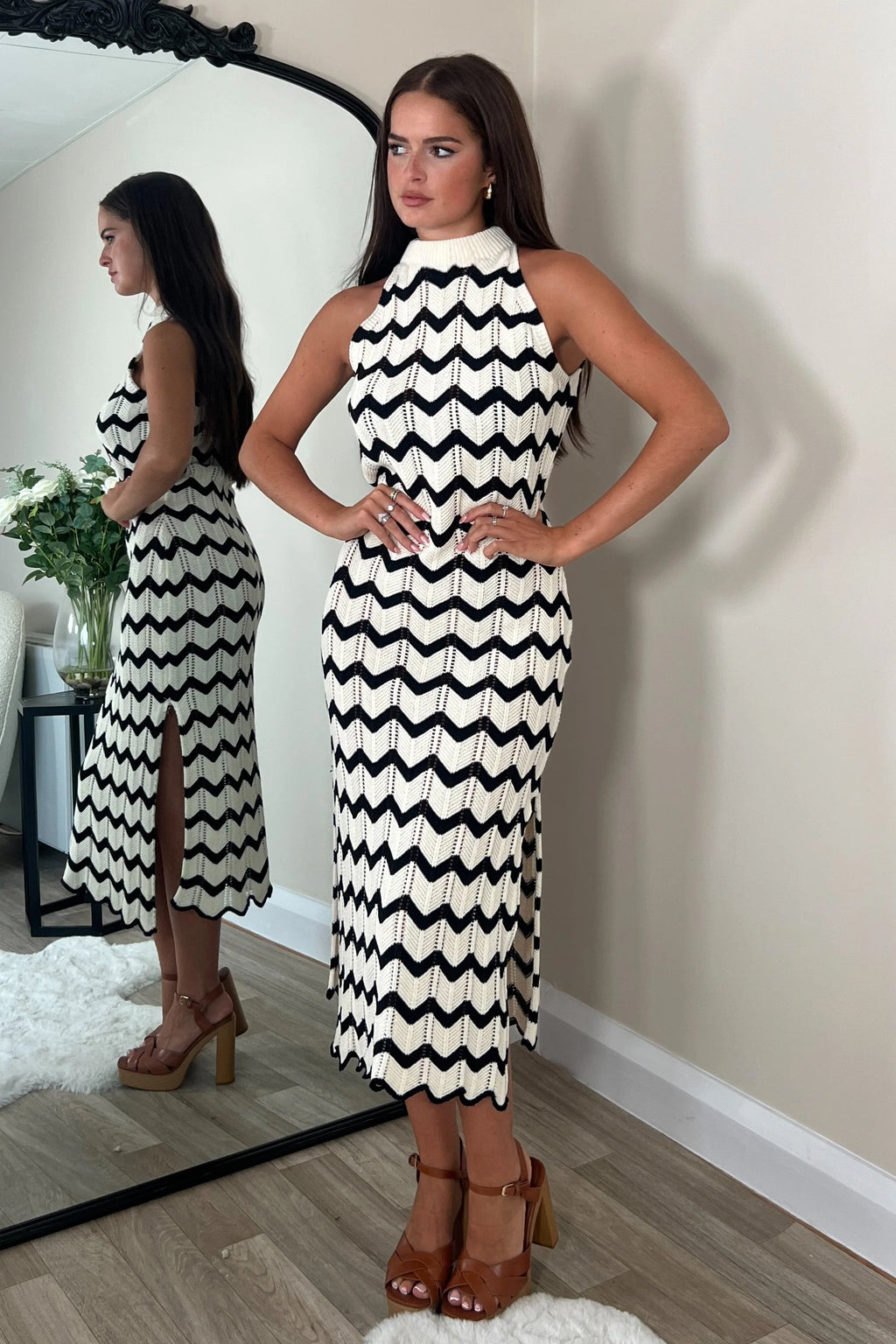 This stunning dress features a chic and intricate crochet design, creating a timeless and elegant look. Perfect for any occasion, this dress will make you feel confident and stylish. Elevate your wardrobe with this must-have piece!
