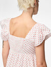 Square neckline - Frilled cap sleeves - Gathered cutline - Elasticated smocked panel at back - Unlined - Regular fit